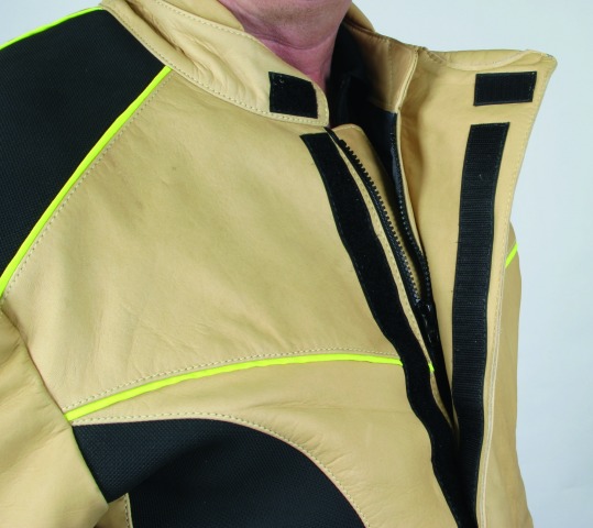 Jacket with reinforced stand-up collar and useful side arm pockets