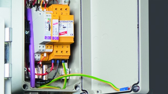 Compact DIN rail mounted surge protective device with screw terminals for multi-core lines.