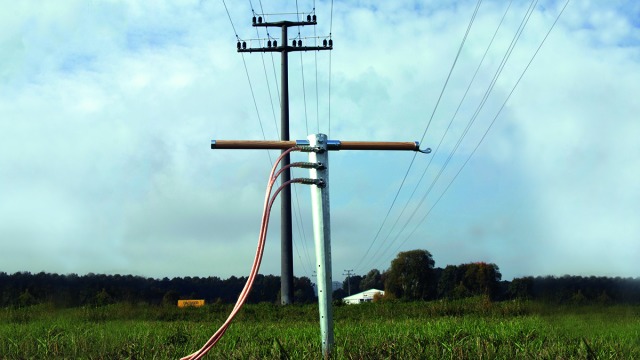 Earthing busbar and earthing cables mounted on a tubular earth electrode